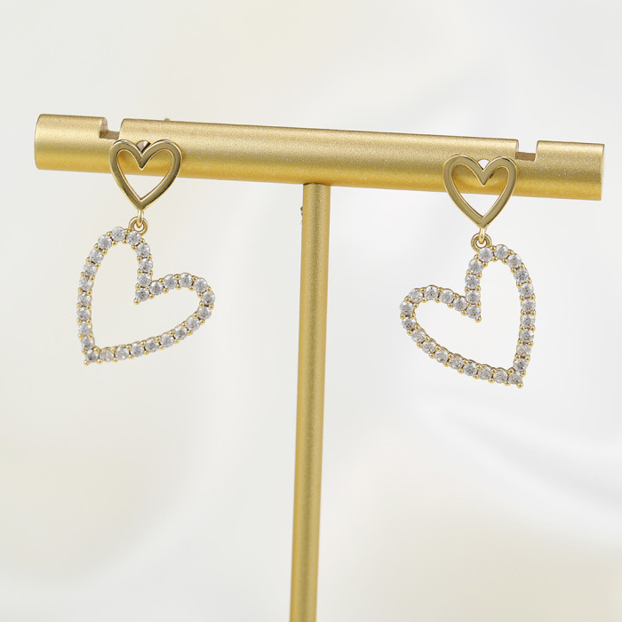 Korean-style Sweet S925 Silver Needle Earrings with Unique Hollow Heart Design, Studded with Stones, Versatile and...