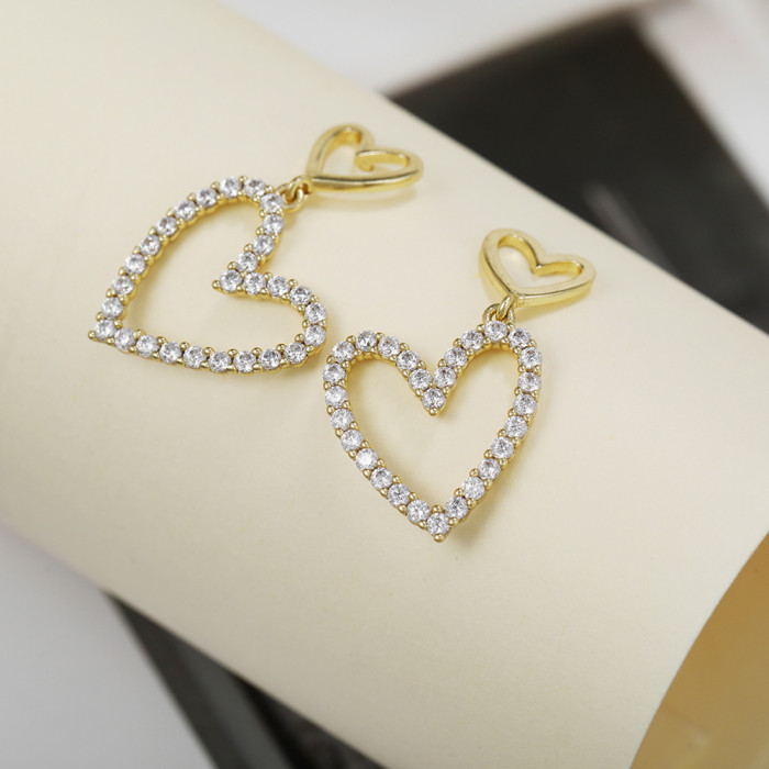 Korean-style Sweet S925 Silver Needle Earrings with Unique Hollow Heart Design, Studded with Stones, Versatile and...