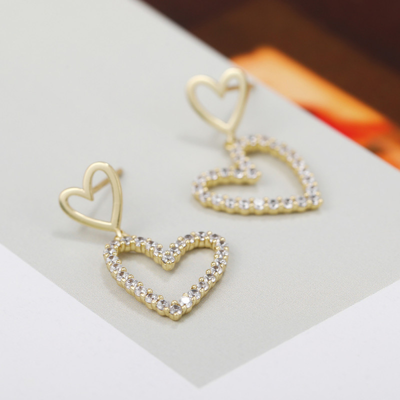 Korean-style Sweet S925 Silver Needle Earrings with Unique Hollow Heart Design, Studded with Stones, Versatile and...