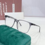 GUCCI transparent frame eyeglasses with silver accents