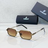 Luxurious Hublot sunglasses with golden accents H012O