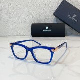 Bold blue Hublot eyeglasses with contemporary flair H024O