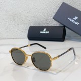 Hublot round gold-rimmed sunglasses