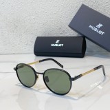 Hublot modern green lens sunglasses