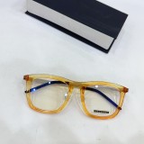 lindberg Chic eyeglass frames from the 2024 Visionary Eyewear Collection, showcasing a variety of styles and colors to match any wardrobe orange