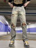 Washed distressed jeans