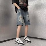  Washed distressed jeans 