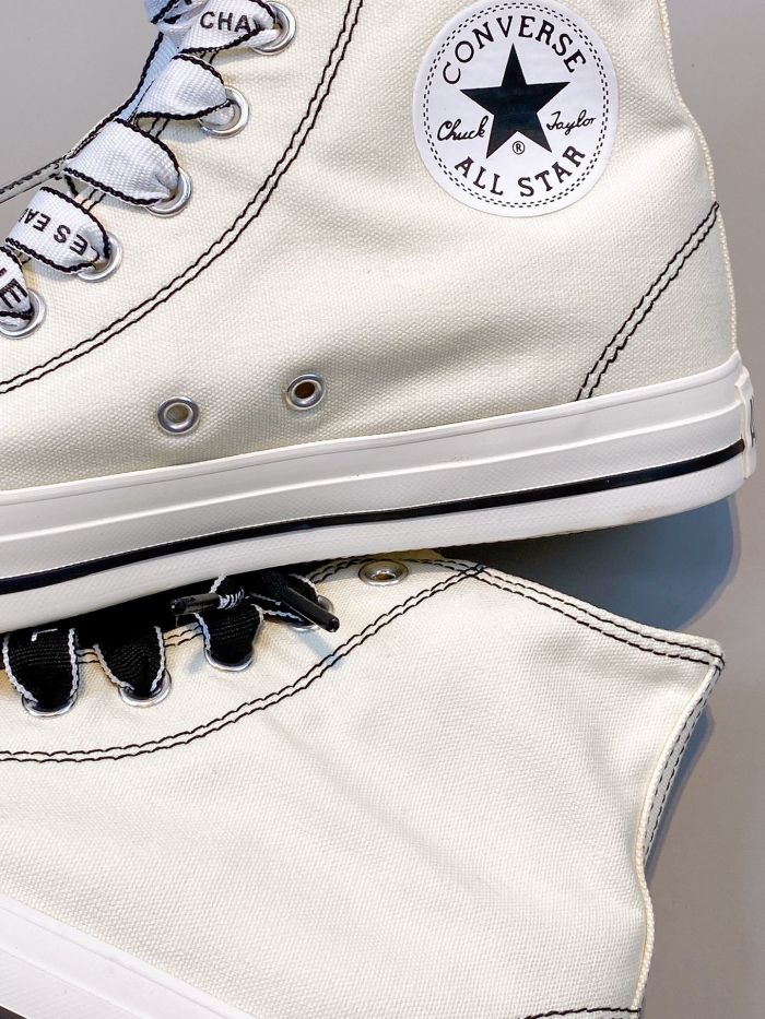 Chanel and converse co branded canvas shoes