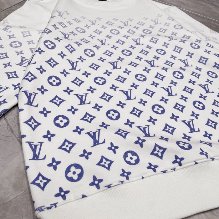 Louis Vuitton's autumn/winter 2020 catwalk design features a crew-neck hoodie with a gradual print LOGO