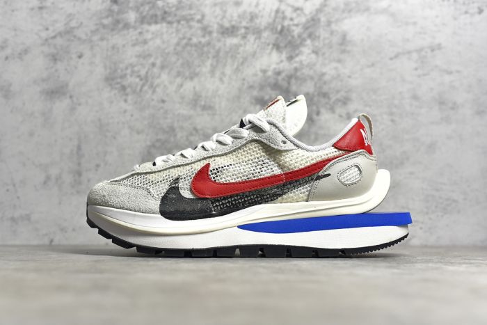 Sacai X Nike VaporWaffle “Royal Fuchsia”