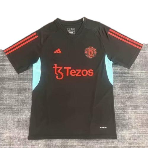 Manchester Utd 23/24 Black/Red Training Jersey