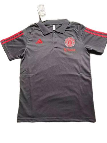 Manchester Utd 23/24 Black Polo Shirts