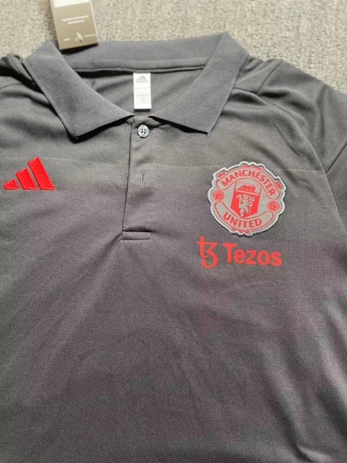 Manchester Utd 23/24 Black Polo Shirts