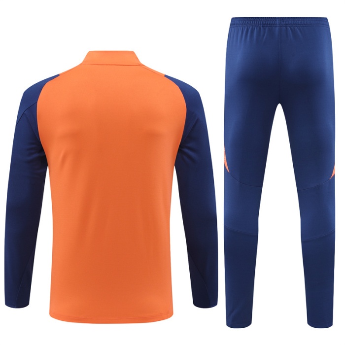 Man Utd 24/25 Tracksuit - Orange/Dark Blue