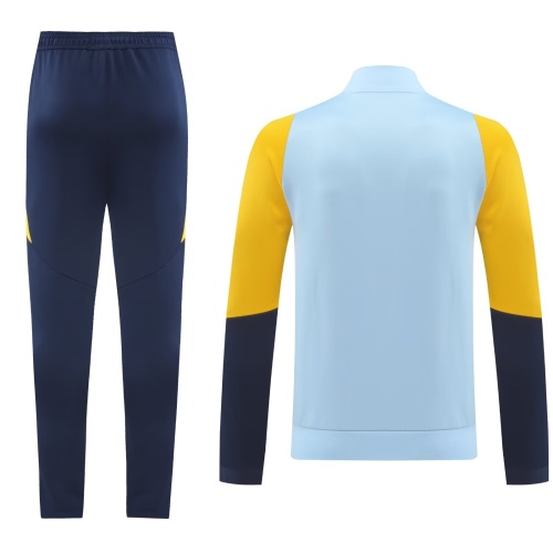 Real Madrid 24/25 Tracksuit - Light Blue/Yellow