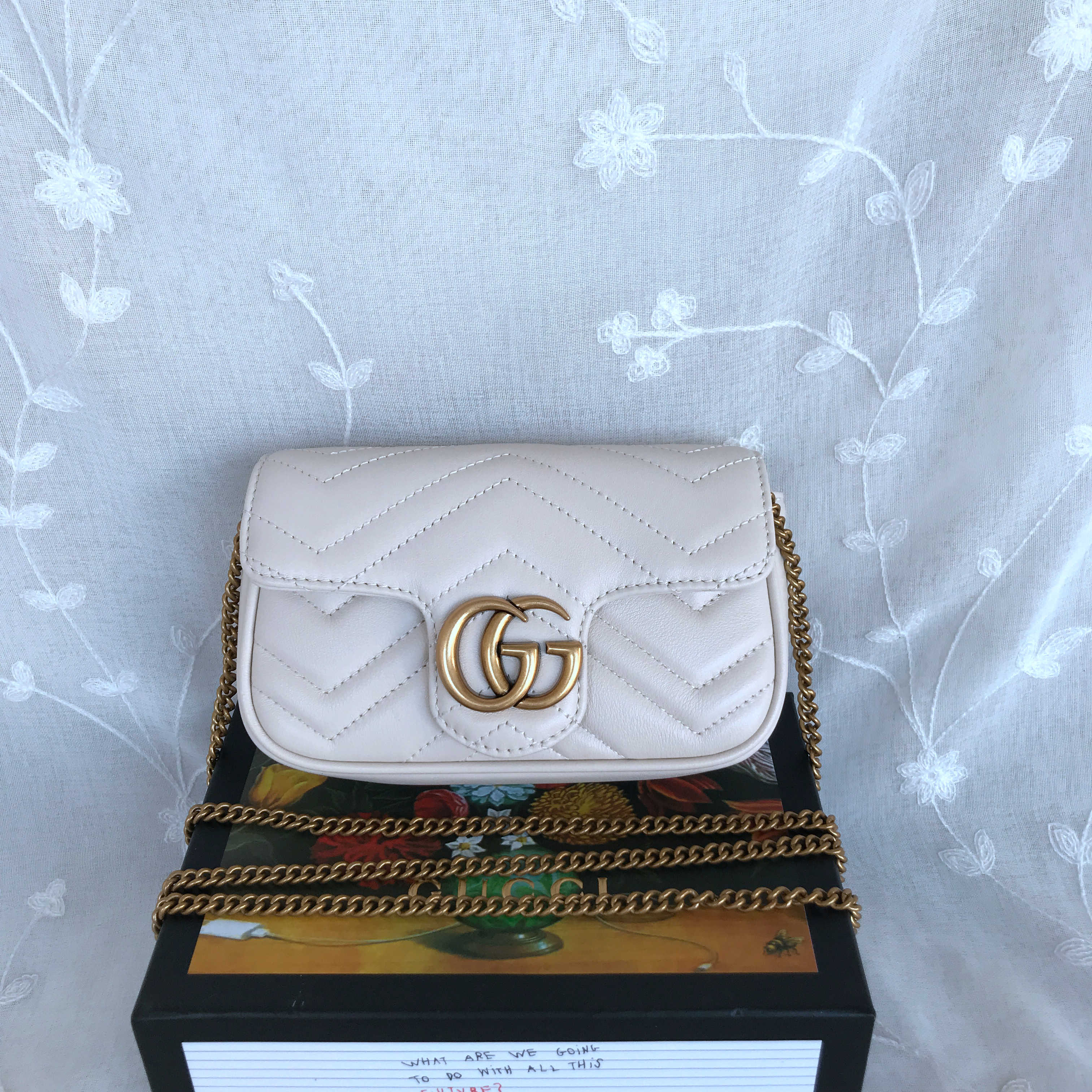 Gucci Marmont Matelasse leather super mini bag 476433