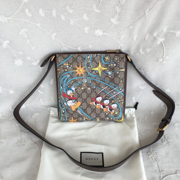 US 170.00 Disney x Gucci Donald Duck print messenger bag 645054