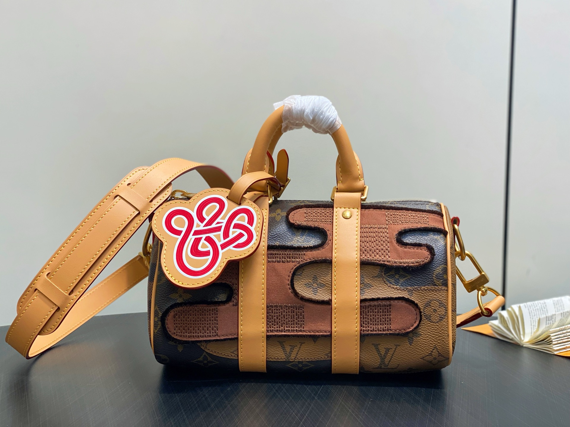 LV Keepall Bandouli M15428