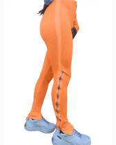 Orange Solid color tight zipper high waist casual split micro flared track pants