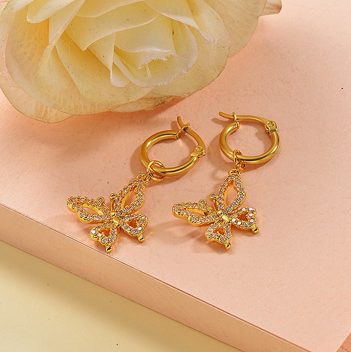 Boucles d'oreilles papillon en acier inoxydable de conception faite à la main de bijoux plaqués or