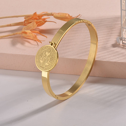 Trendy solid gold stainless steel solid bracelet with round saint pendant