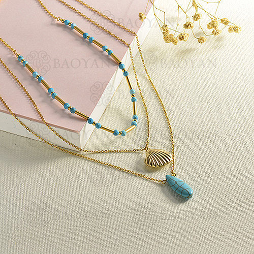 Shell style layered gold necklace