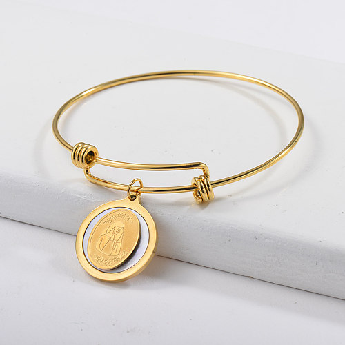 Adjustable gold bracelet with white shells