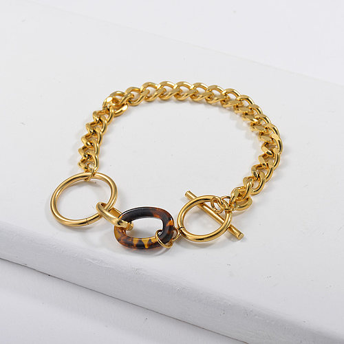 Golden stainless steel polished chain bracelet with leopard print pendant