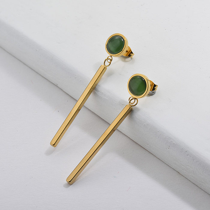Gold Dangle Cross Earrings with Emerald Stone