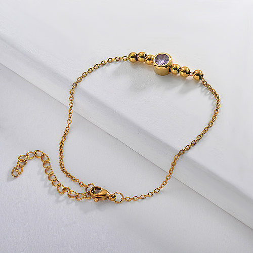 Golden stainless steel steel ball bracelet with zircon pendant