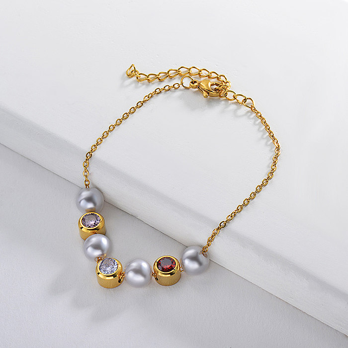Golden stainless steel bracelet with pearl and zircon
