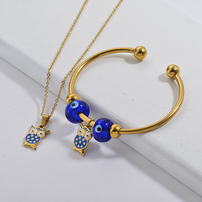 Acier inoxydable célèbre marque plaqué or hibou charme collier bracelet ensemble de bijoux