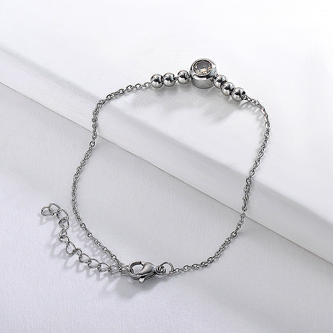 Stainless steel ball bracelet with white zircon pendant
