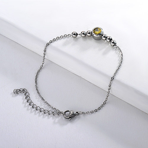 Bracelet boule en acier inoxydable avec pendentif zircon jaune