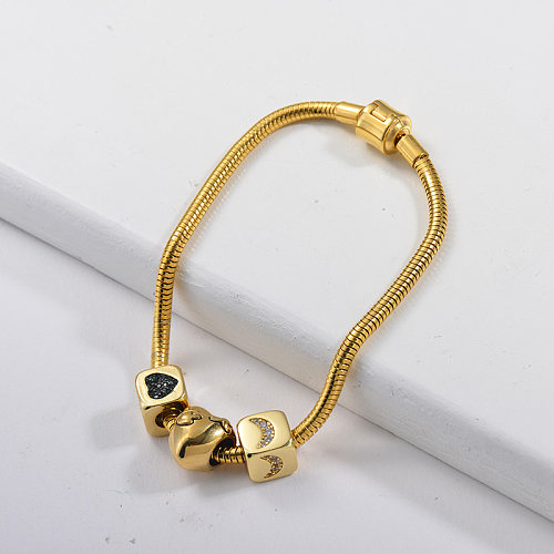 Stainless steel gold spring bracelet and pendant