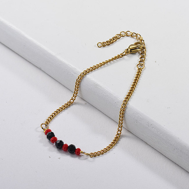 Bracelet chaîne torsadée avec perles de cristal noires et rouges