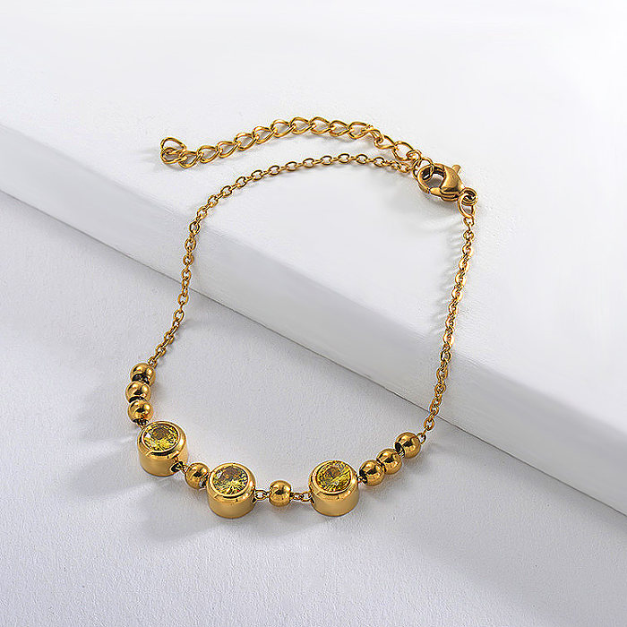 Golden stainless steel bracelet with yellow zircon