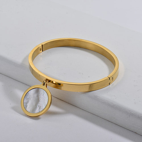 Golden stainless steel bracelet with white shells