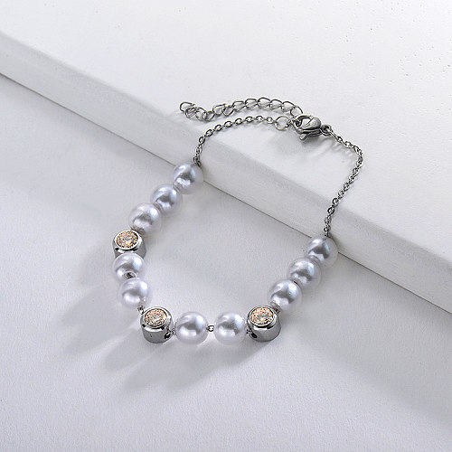 Stainless steel pearl bracelet with white zircon pendant