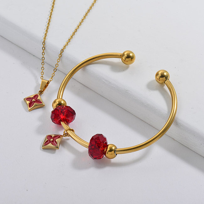 Acier inoxydable célèbre marque plaqué or fleur charme collier bracelet ensemble de bijoux