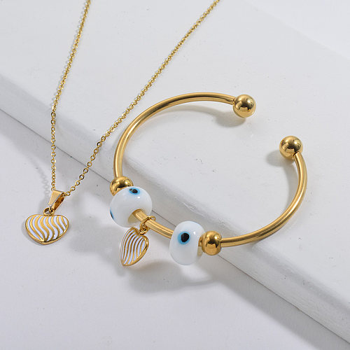 Conjunto de joyería de brazalete de collar de encanto de oído chapado en oro de marca famosa de acero inoxidable