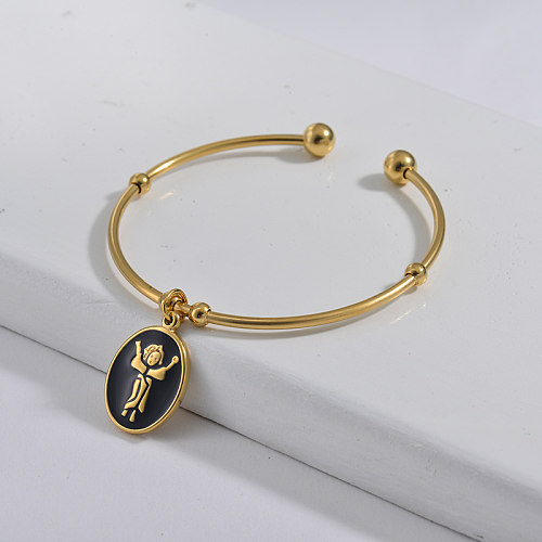 Simple style golden stainless steel bracelet with black oil drop pendant