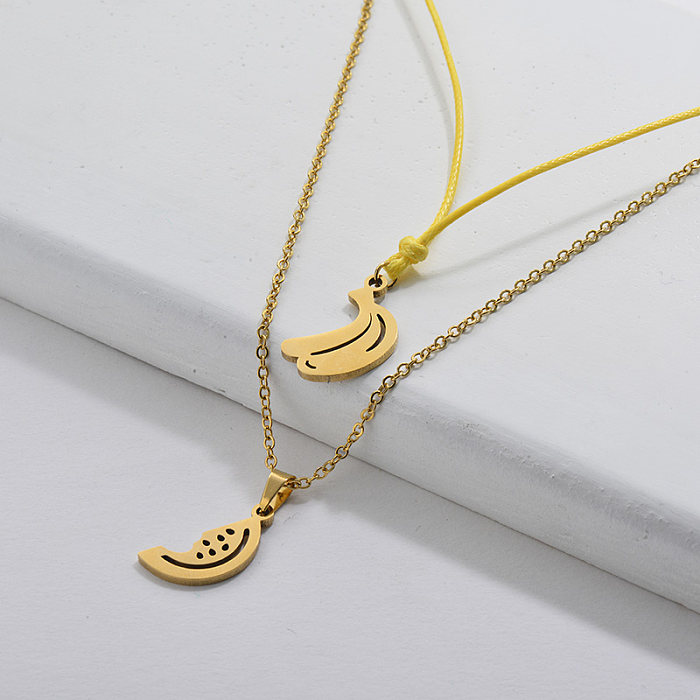 Collier mignon de doubles chaînes de pendentif de fruit de banane d'or d'acier inoxydable pour des filles
