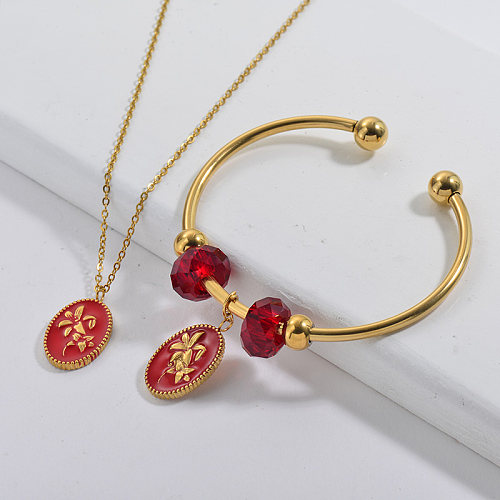 Conjunto de joyas de brazalete de collar con dije de flor chapado en oro de marca famosa de acero inoxidable