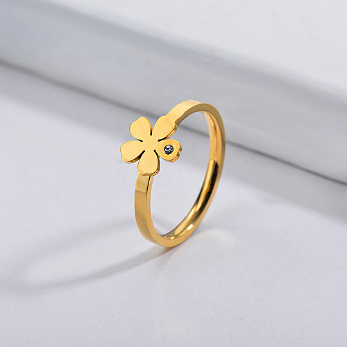 Commerce de gros en acier inoxydable célèbre marque or bague de mariée fleur simple