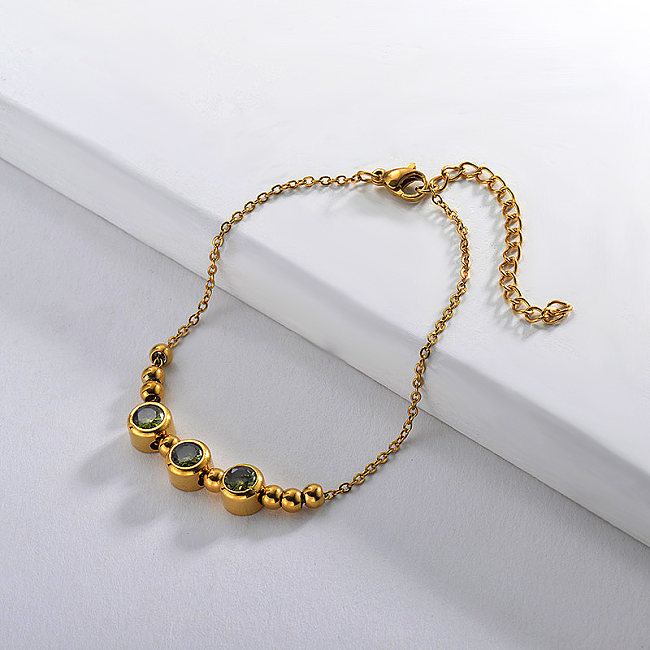 Gold stainless steel steel ball bracelet with green zircon pendant