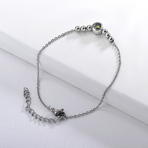 Stainless steel ball bracelet with green zircon pendant