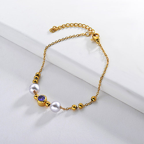 Golden stainless steel bracelet with pearls and zircon