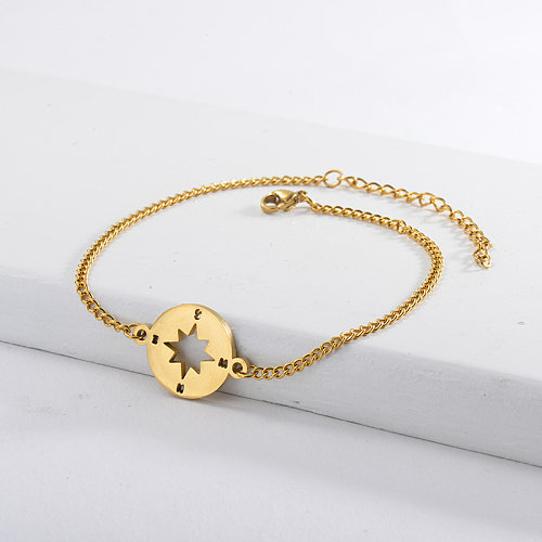 Golden stainless steel curb bracelet and compass pendant
