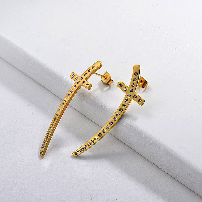 Boucle d'oreille croix en cristal plaqué or